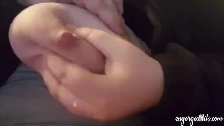 BBW squeezing her milky tits