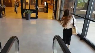 Cute asian girl with remote vibe outside