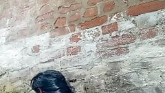 Desi girl bathing  outside