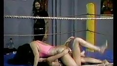 Girls cat fighting on mattress