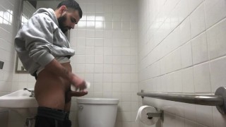 Hot big cock coworker caught on hidden cam peeing in employee restroom