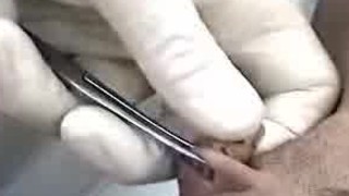 Hot girl getting her clit pierced