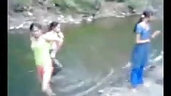 Indian girl in river with theri bfs