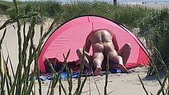 Pumping on the nude beach