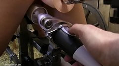 Bdsm submission training with slave tied to sex machine.