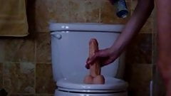 Soccer Mom with big boobs ride a Dildo on Toilet