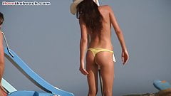 sweet busty brunette on the beach