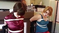 Two chair tied babes . . .