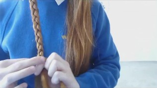 Dolly Braids her Hair