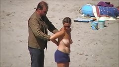 German milf on french beach spy. Shaky quality.