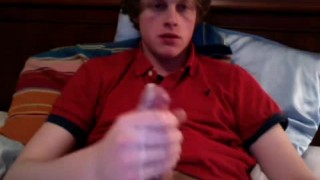 Straight Faced Red Head Twink Shoots A River Of Nut