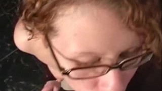 Tiny Redhead with glasses gives amazing smoking blowjob