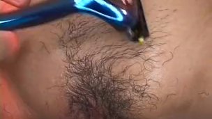 Busty Japanese chick gets cunt toyed