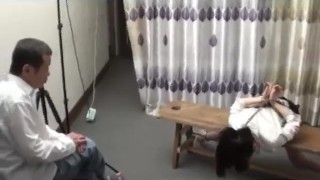 Chinese police woman tied up