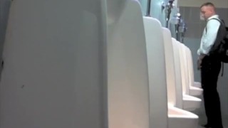 College guy taking a leak and checking out my dick.