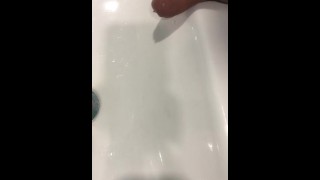 Desperate trying to hold in the sink leaking moaning