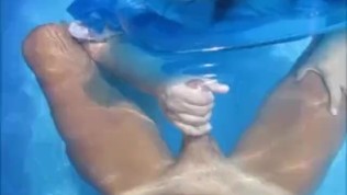 mom sneaks step son underwater handjob & cum underwater swiming in public
