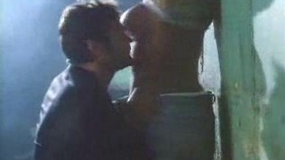 Pamela Anderson against wall sex scene