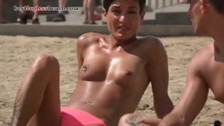 Tanned beautiful womanTopless Beach Voyeur