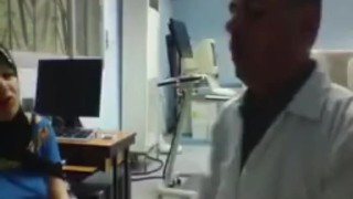 Arabic pervert doctor recording his female patient