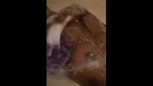 Black tattoo chick showertime