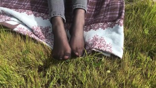 In black tights in the park