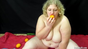 Inserts oranges into pussy and masturbates, mature bbw with big tits