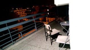 Real voyeur couple shagging loud on balcony in athens hostel