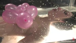 Tape gagged vibrating and straitjacket in water