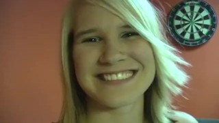 Teen smokes cigarette while trying on outfits for photo shoot