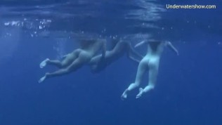 Underwater threeway lesbians