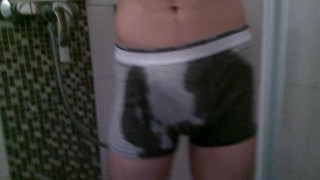 cute boy pissing in pants