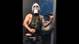 Fit Guy in Hockey Mask Pees Wildly All Over Bathroom.