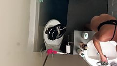 Gorgeous brunette bathroom spy