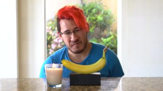 Sexy interracial man contemplates shoving a rock hard banana up his hole