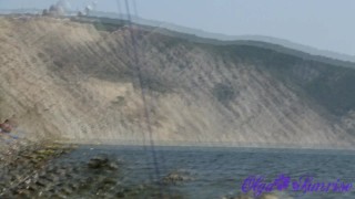 Blowjob on a nudist beach