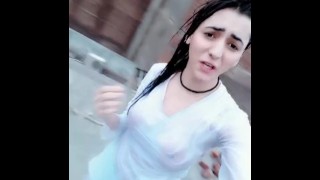 Desi girl showing tits in the rain