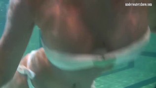 Hot chicks Irina and Anna swim naked in the pool