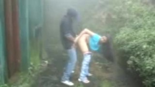 indian Lovers making-out in rain outdoor