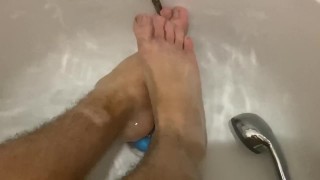 Perfect guy feet in bathroom