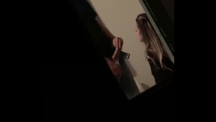 She is sucking french voyeur by window