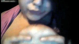 Arab slut sucks her tits