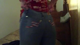 Big butt redhead tries on jeans