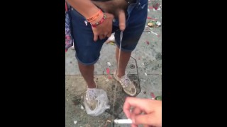 Festival  Pees in a Cup, Then All Around Crowd’s Feet.