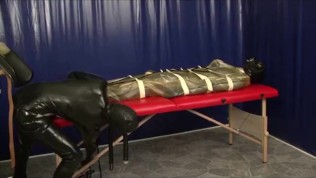 Latex Femdom And Rubber Slave In Bondage Bag And Breath Control Gas Mask