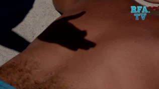 Messing With Sunbathing Babe On The Beach