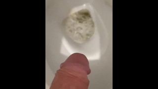 Perfect guy pissing in public toilet
