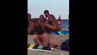 Public threesome fuck on the beach